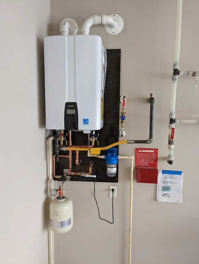 Professional plumber installing copper piping in a Casselberry home